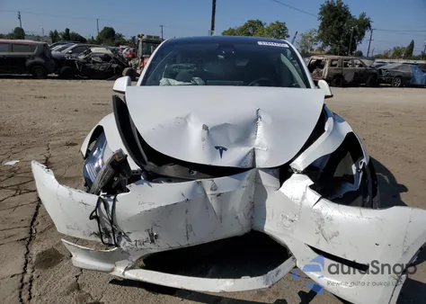 2023 Tesla Model Y z USA, uszkodzony, nr VIN 7SAYGDEF0PA049598